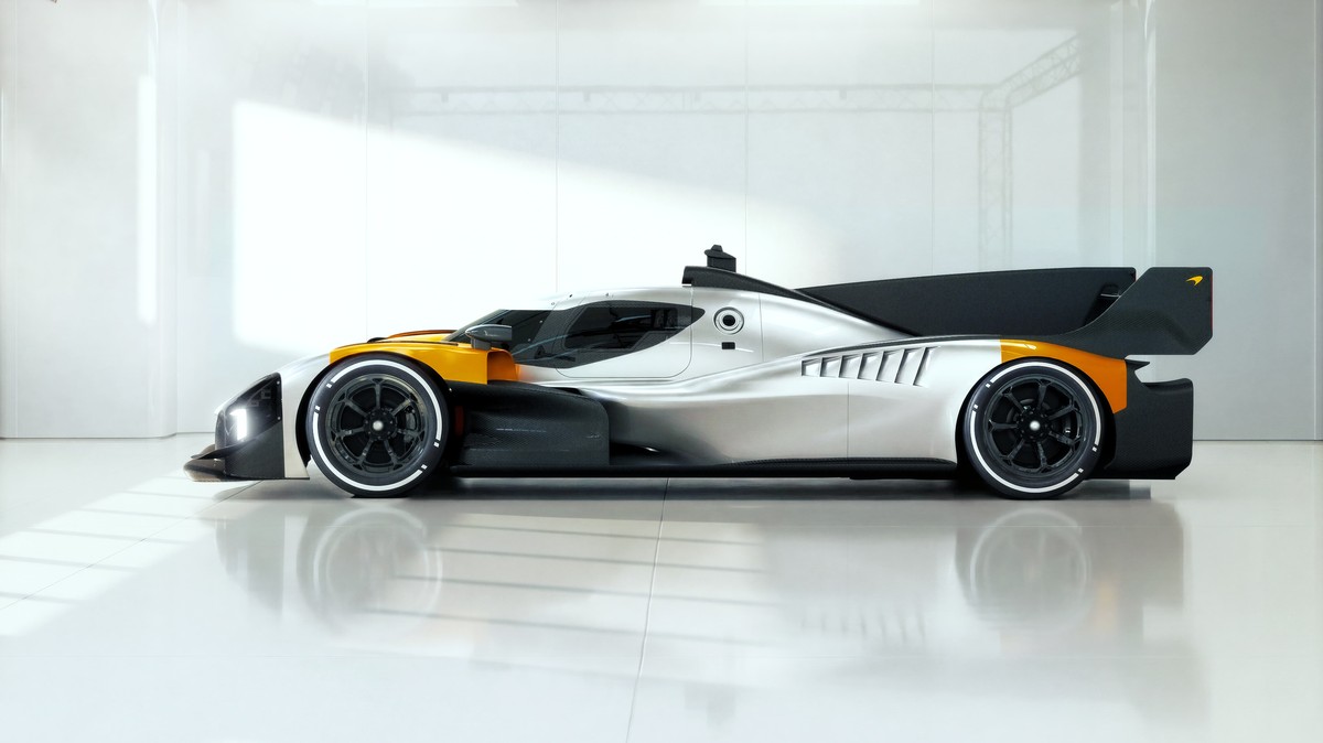 McLaren MCL-HY side profile showing full LMDh silhouette and papaya orange livery accents